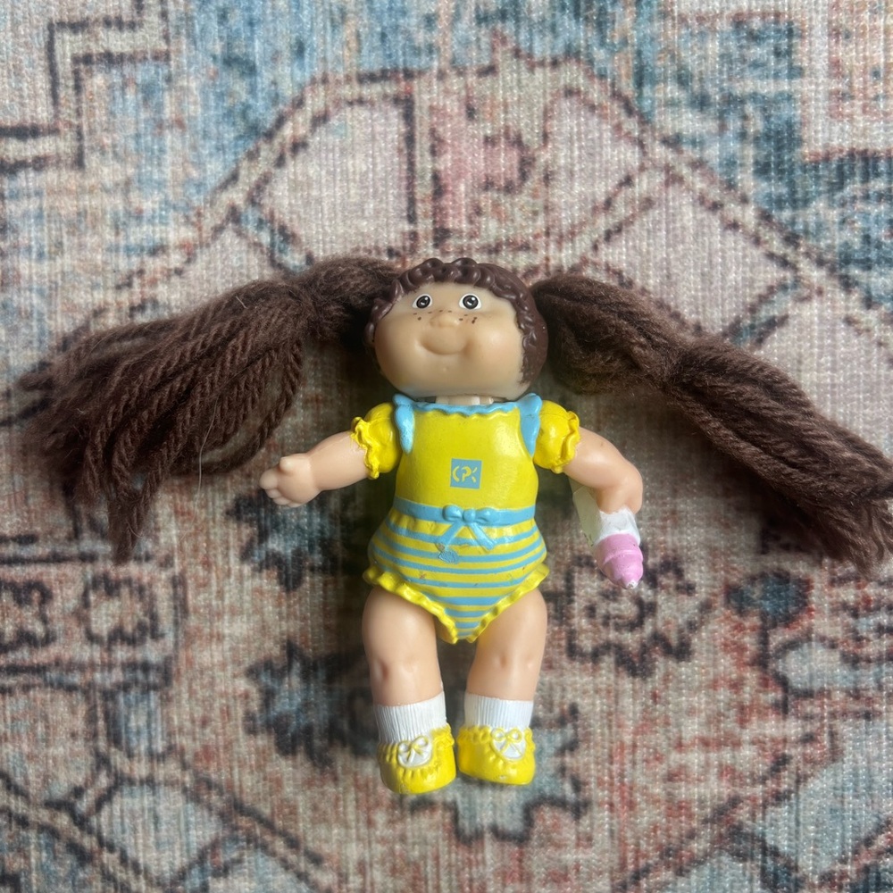 Cabbage Patch Kids 1984 vintage Striped Baby Doll with Brown Hair bottle